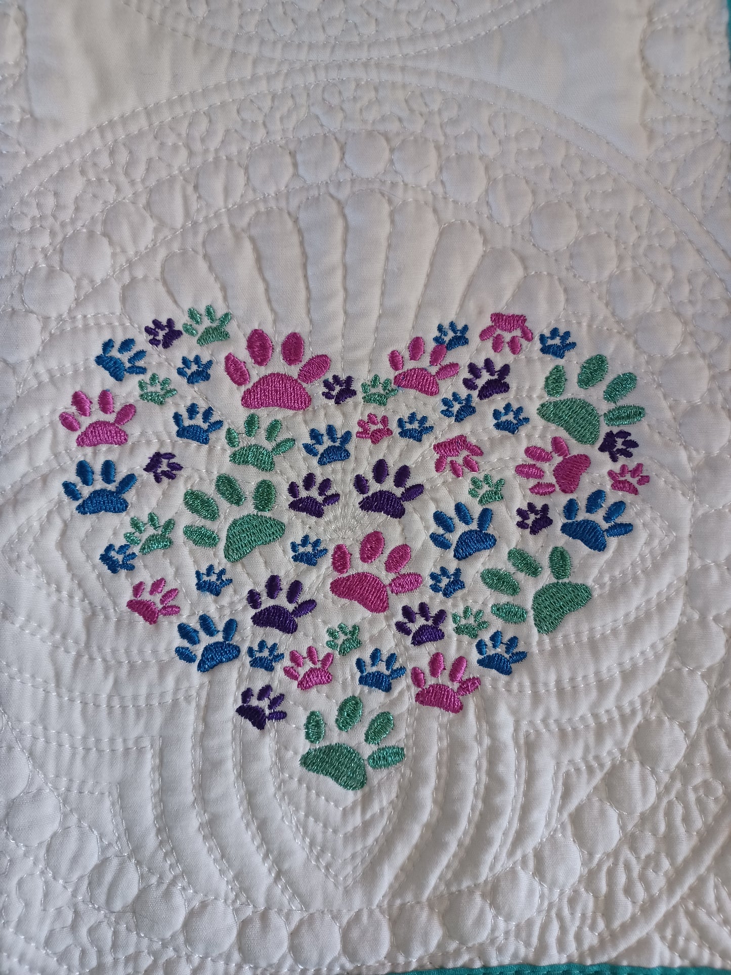 36x45 embroidered paws heart heirloom quilt