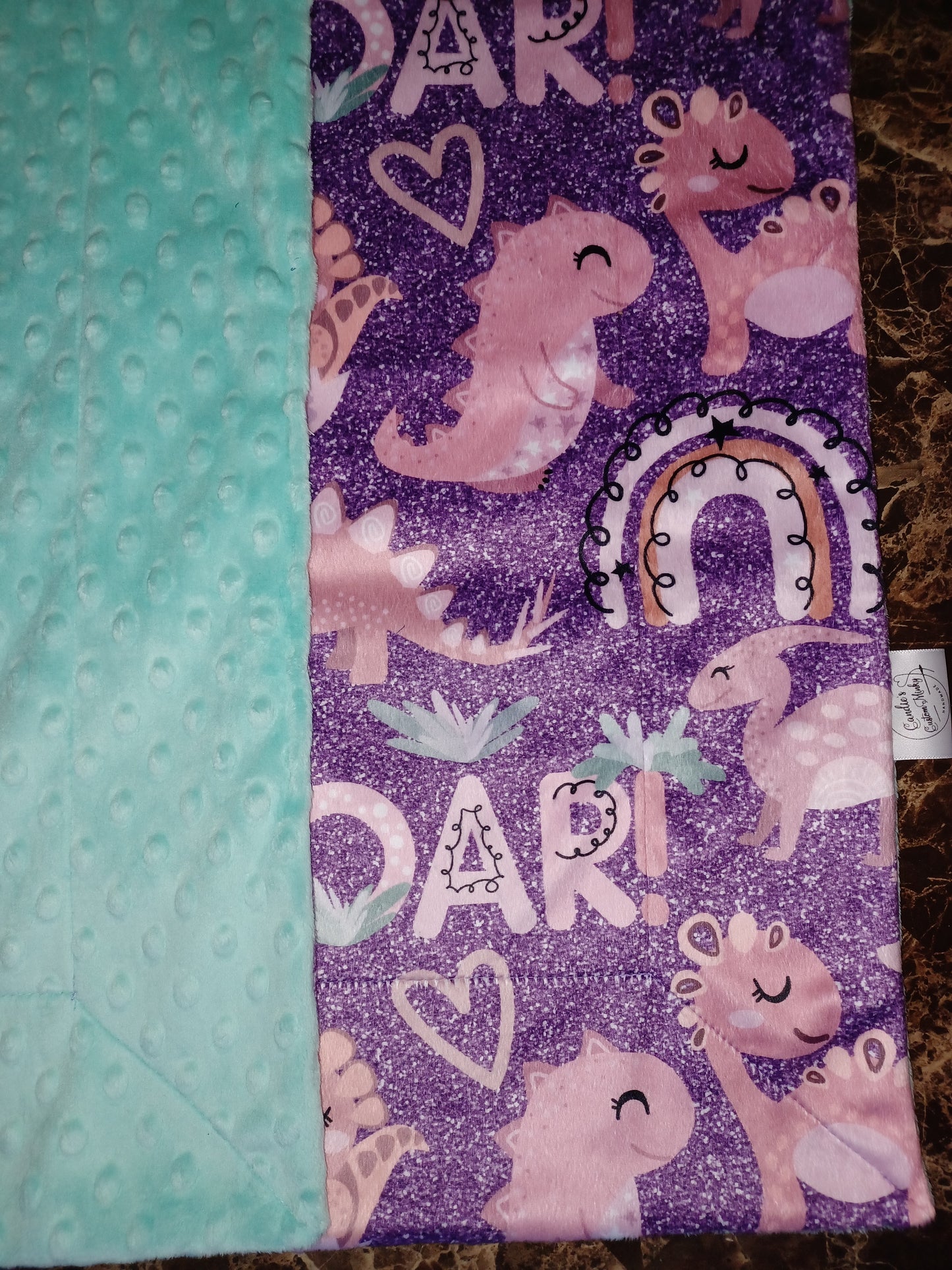 27x36 faux glitter Dino print on Aruba dimple dot
